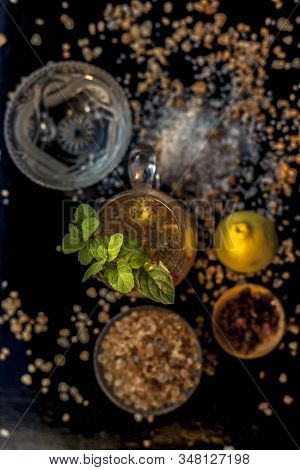 Special Gond Katria Summer Drink In A Glass Mug On Wooden Surface With Some Black Pepper And Lemon J
