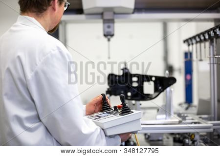 Quality Engineer Measuring Some Moldings By Professional 3d Measuring System Machine, Industrial Con