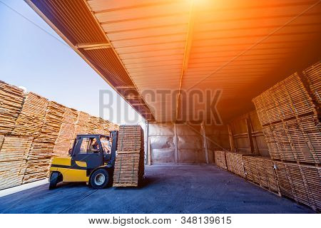Forklift Loader Load Lumber Into A Dry Kiln. Wood Drying In Containers.