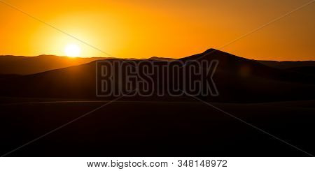 Sunset Over The Golden Orange Sand Dunes Of Sahara, Merzouga, Morocco