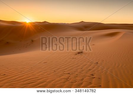 Golden Hour Sunrise Over The Sahara Dunes, Merzouga, Morocco
