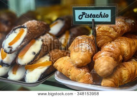 Sweet Italian Desssert, Pile Of Cannoli Pastry Filled With Ricotta Cream Cheese And Croissants With 