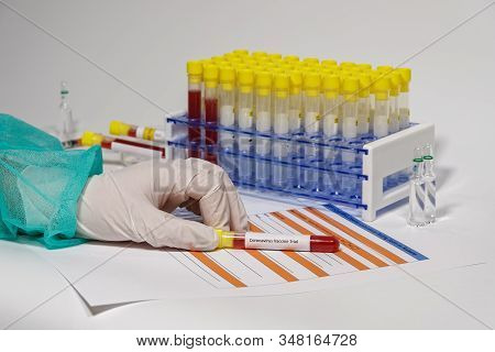 Coronavirus 2019-ncov World Outbreak Tests On Microbiology Lab. Chemist With Protective Uniform & Gl