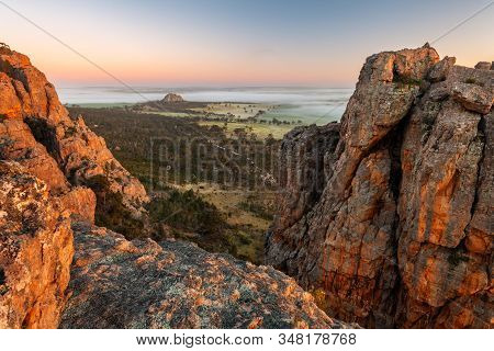View From Mount Arapiles Into The Misty Morning Plains