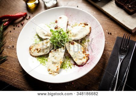 Cooked Green Mussels With Parmegano And Cream Cheese
