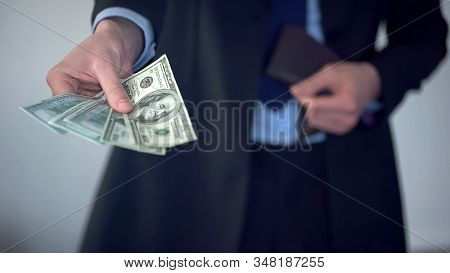Man Giving Bundle Of Dollars, Purchase In Shop, Payment Of Penalty, Kickback
