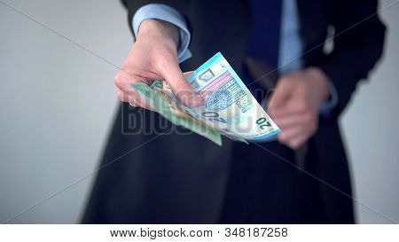 Man Proposing Bundle Of Euros, Purchase In Shop, Payment Of Penalty, Kickback