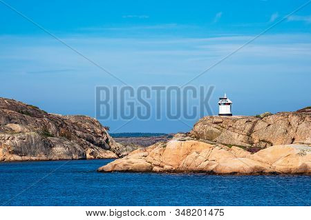 Lighthouse Near The City Fjaellbacka In Sweden.