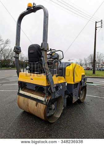 Big Roll Compactor At Construction Site, Used For Road Repair