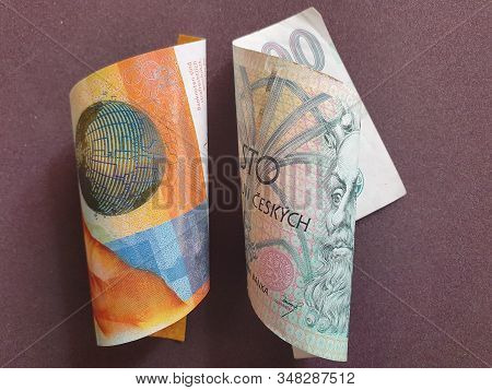 Swiss Banknote Of Ten Francs And Czech Bill Of 100 Korun