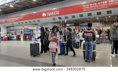 Osaka, Japan- 03 Dec, 2019: Traveler With Luggage At Kansai Airport Station In Osaka Japan. A Railwa