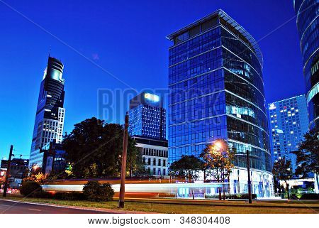 Warsaw,poland. 21 February 2017. Rondo Daszynskiego. Buildings At Night And  Roving Car With Blur Li