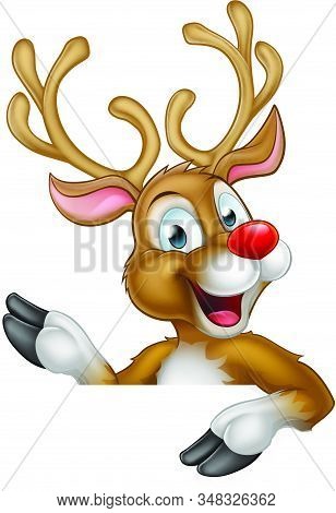 Cute Cartoon Christmas Reindeer Pointing At A Sign