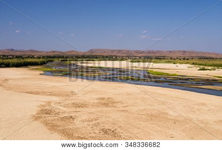 Exotic Tsiribihina River During Dry Season With Rice Paddy Fields, Madagascar