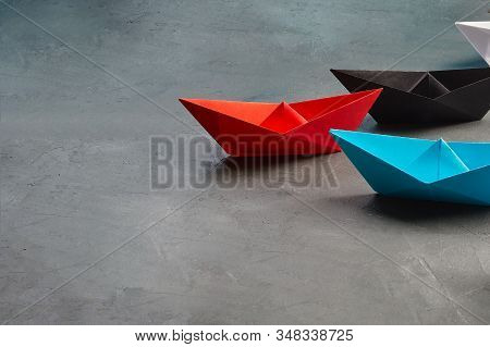 Business Concept, Paper Boat, The Key Opinion Leader, The Concept Of Influence.red,blue And Black Pa