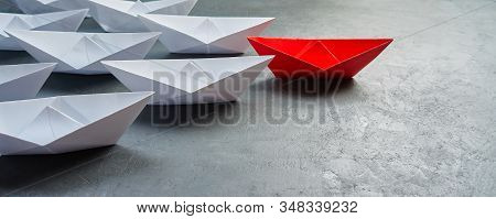 Business Leadership Concept, Paper Boat, The Key Opinion Leader, The Concept Of Influence. One Red P