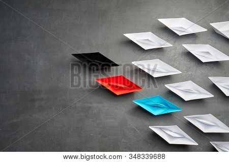 Business Concept, Paper Boat, The Key Opinion Leader, The Concept Of Influence.red.blue And Black Pa