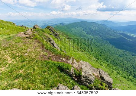 Mountain Landscape In Summer. View From The Top Of Carpathian Watershed Ridge In To The Distance. Bo
