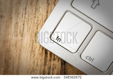 Computer Keyboard - Silver Keyboard Of A Laptop With Button Fn Isolated. Home Office With Portable M