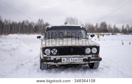 Russia, Novosibirsk - November 30, 2019. Russian Old White Low Car 