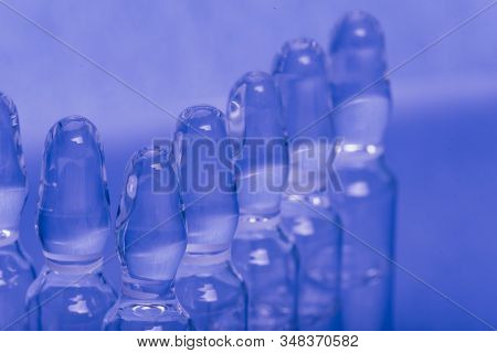 Glass Medical Ampoule Vial For Injection. Medicine Is Liquid Sodium Chloride With Of Aqueous Solutio