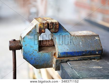 Old Iron Vice In A Workshop, Selected Focus, Narrow Depth Of Field