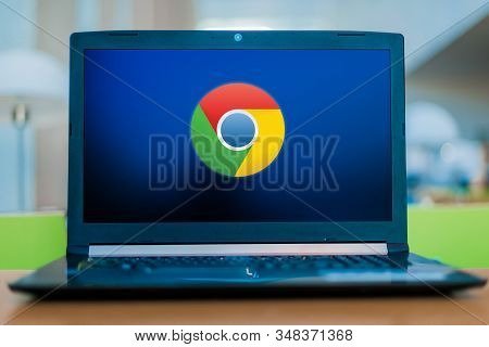 Poznan, Pol - Dec 11, 2019: Laptop Computer Displaying Logo Of Google Chrome, A Cross-platform Web B
