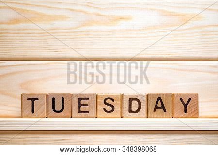 Weekday On Wooden Blocks. Vintage Letterpress Printing Blocks. Tuesday On Toy Cubes. Tuesday Backgro