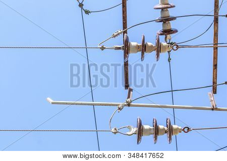 Close-up Of A Power Line Against The Sky