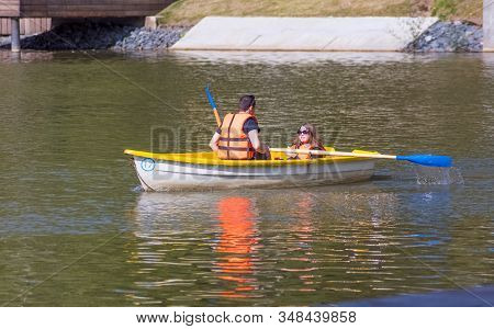 City The Moscow .holidaymakers On The Boat - The Third Kamenskiy Pond At Enea.russia.08.27.2019