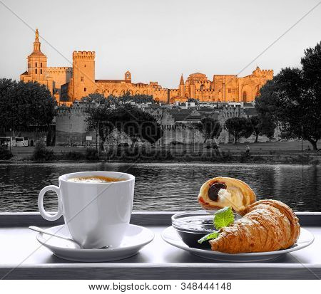 Coffee With Croissants Against Avignon Town In Provence, France
