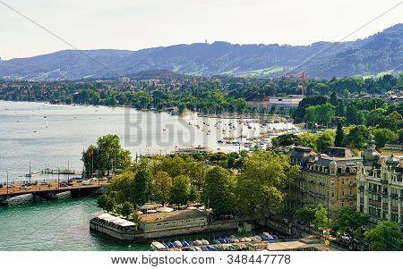 Boats And Quaibrucke At Limmat River In Zurich Old Town