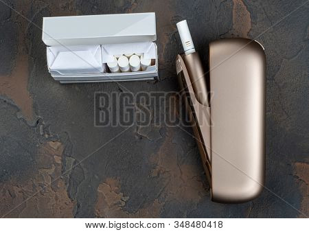 New Heat-not-burn Tobacco Heating System On Dark Background