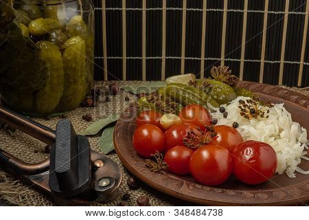 Pickled Green Cucumbers, Tomatoes And Cabbage Are Great For Winter Dishes, Pickles. Nearby Is A Glas