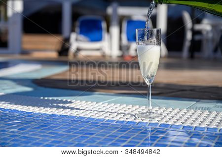 Pool Party With One Glass Of Bubbles White Champagne Or Cava Wine, Romantic Event On All Inclusive H