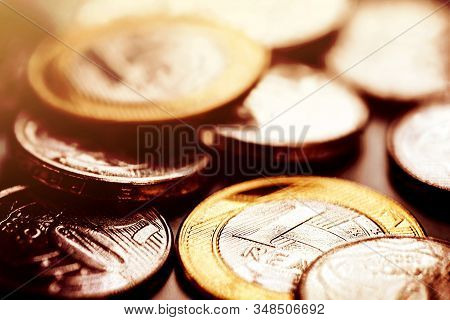 Brazilian Real Coins, With Golden Tone. Banking Savings Or Investment Concept. Coins A Real Selectiv