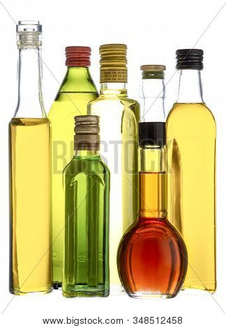 Bottles With Olive Oil, Balsamic Vinegar And Grape Seed Oil
