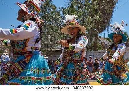 Arica, Chile - February 11, 2017: Tinkus Dance Group Dressed In Ornate Costumes Performing A Tinkus 