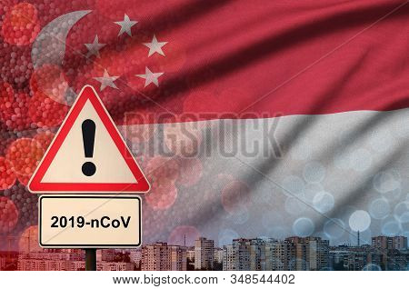 Singapore Flag And Coronavirus 2019-ncov Alert Sign. Concept Of High Probability Of Novel Coronaviru