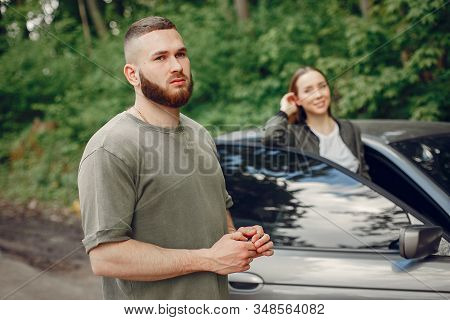 Beautiful Couple Spend Time On A Summer Forest