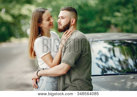 Beautiful Couple Spend Time On A Summer Forest