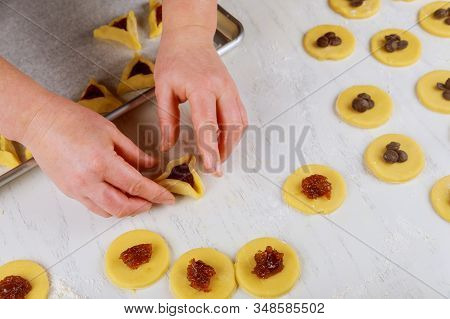 Making Hamentaschen Cookies With Jam For Purim. Jewish Holiday Concept,