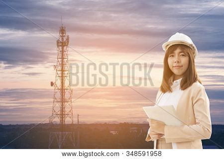 Electrical Engineering Woman Wear White Hard Hat And Holding Contract Folder. Business Concept.