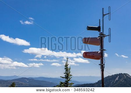 A Special Cellular And Radio Antenna Located High Up On The Hilltop Of Kootenay Valley Mountains, In