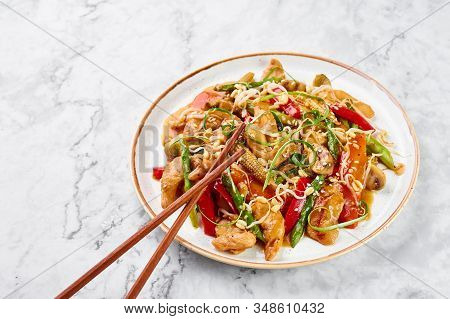 Chicken Chop Suey In White Plate On Marble Background. Chop Suey Is American Chinese Cuisine Dish Wi