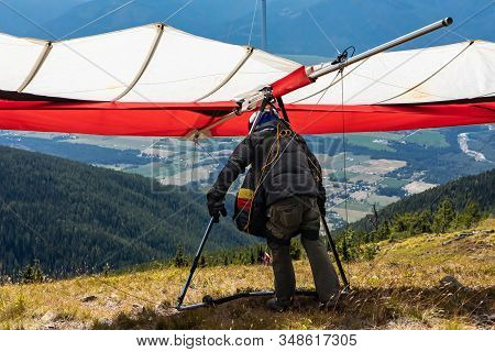 Paraglider About To Launch At The Top Of The Hill, Creston, British Columbia, Canada. Kootenay Valle