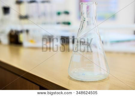 image of test tubes and flasks on a table