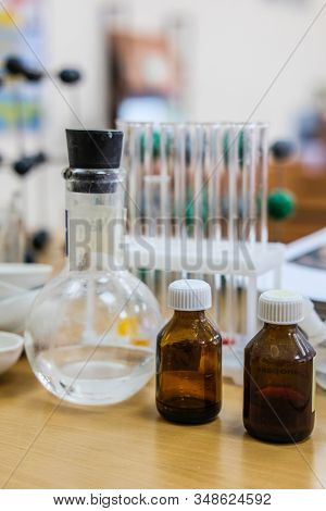 image of test tubes and flasks on a table