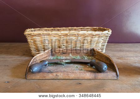 Old Metal Chopper With Rosemary Herbs On A Wooden Shovel. Vintage Traditional Rustic Kitchenwater Ba