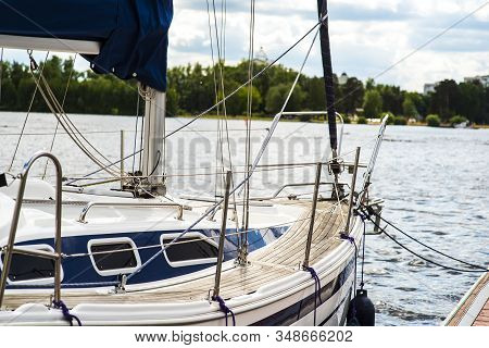 A Mooring With A Mooring Line Tied Around It With Boats And Ships In The Background In A Harbour Moo
